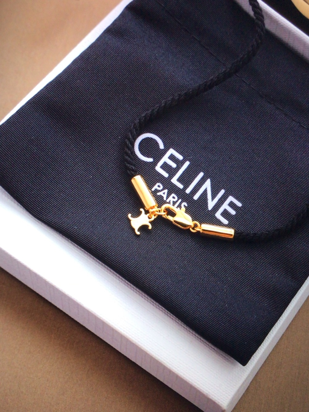 Celine Gold Teardrop Pendant Necklace with Black Cord - Picture 3 of 6